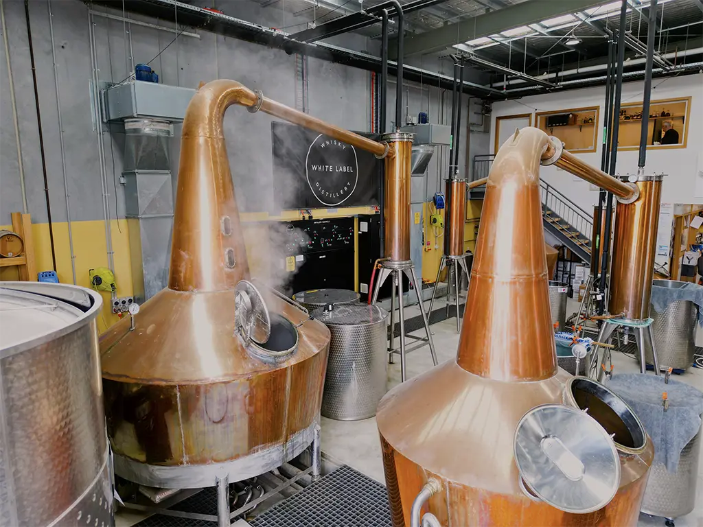 state of the art copper pot stills at the white label distillery in tasmania